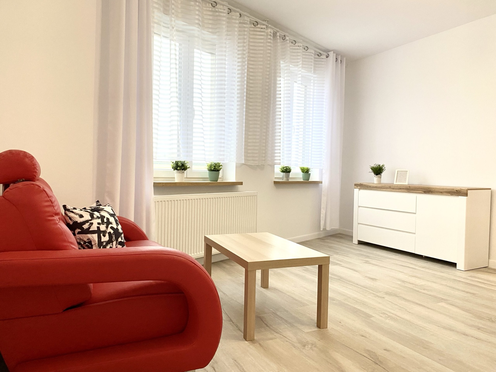 Pokój dzienny w kawalerce przy ul. Palacza